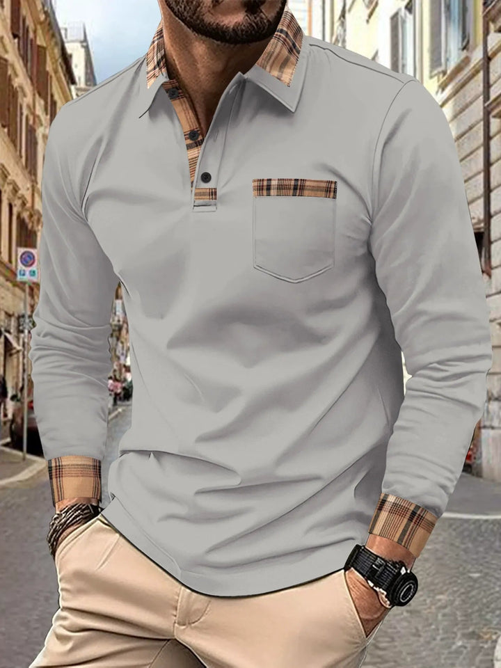 Rood heren poloshirt lange mouwen met elegante ruitdetails. Essentieel voor een nette, casual herenlook.