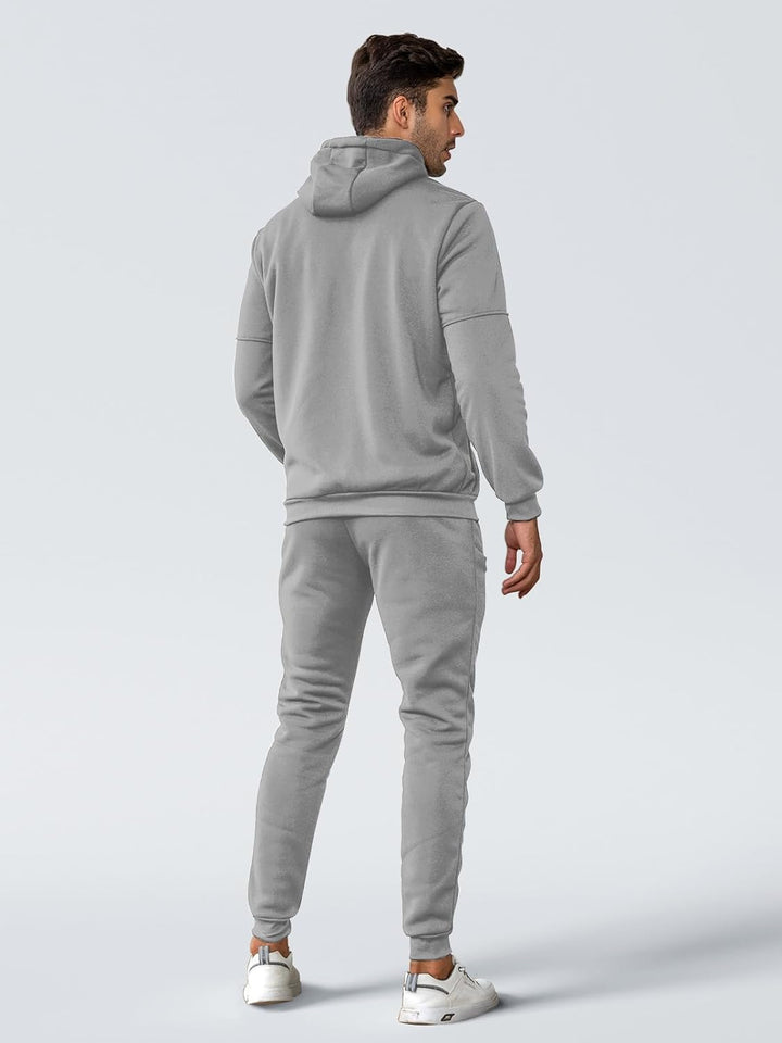 "Stijlvol Jamie trainingspak heren: ademend, grijs/slim-fit pullover en broek, ideaal voor sport en casual wear."