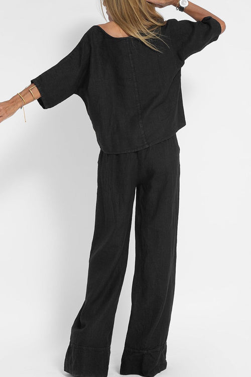 "Stijlvol katoen-linnen damespak, cropped top en wijde broek, licht ademend, ideaal voor zomer, modieus en comfortabel."