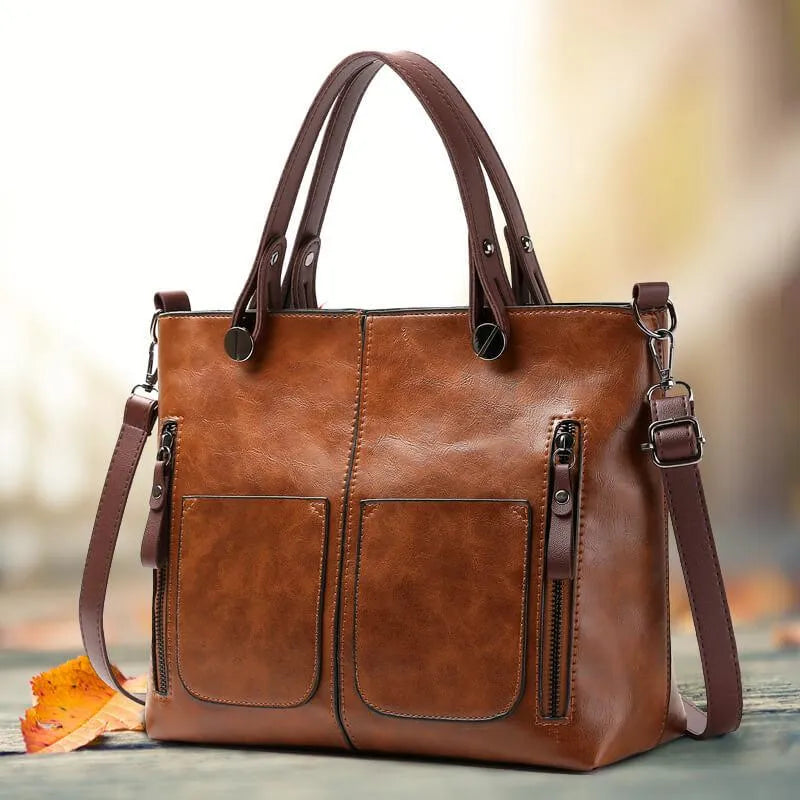 Stijlvolle bruine leren damesschoudertas, elegant mode accessoire voor moderne vrouwen.