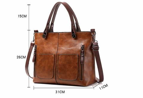 Leren schoudertas, een veelzijdig en elegant accessoire voor dames in modebewuste kleuren.
