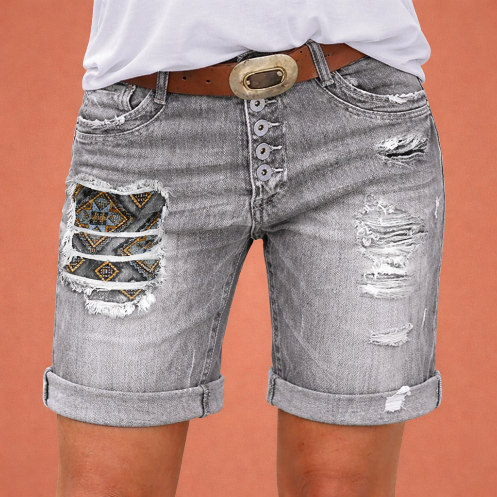 Stijlvolle dames korte broek met ripped details, perfect voor zomerse dagen. Casual en comfortabele grijze shorts.