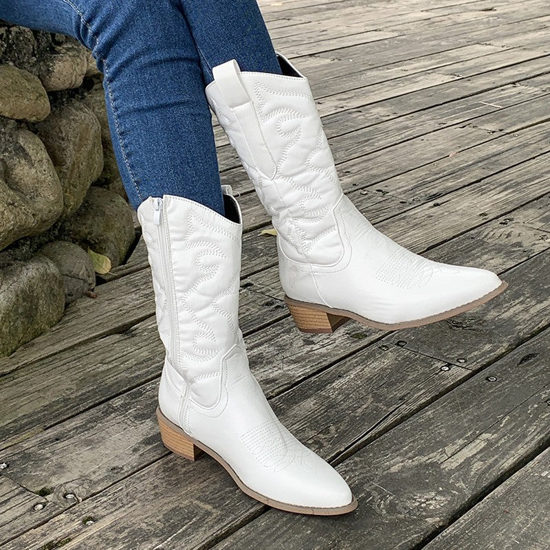 Roze metallic cowboylaarzen voor dames, een unieke en trendy keuze voor een opvallende herfst/winter outfit.