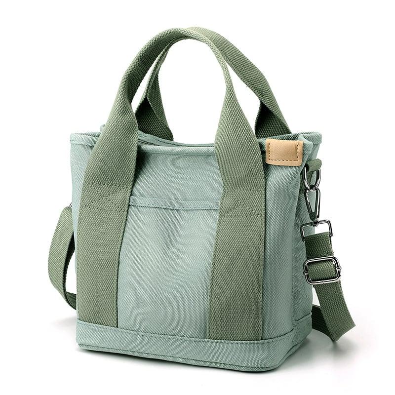 Compacte dames tas met veilige sluiting en modern design; een trendy accessoire.