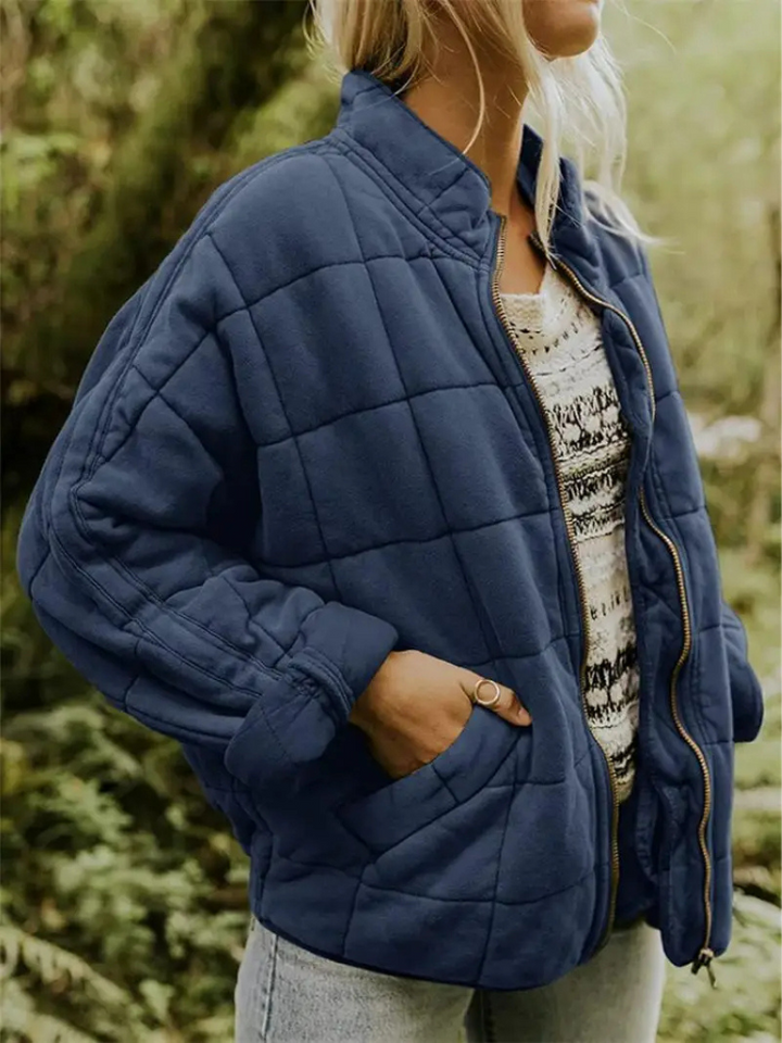 Elegante dames tussenjas met ritssluiting, gewatteerd, staande kraag, perfect voor de lente.