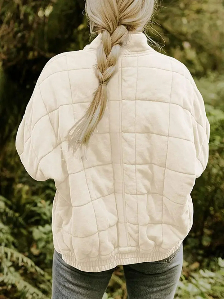 Comfortabele casual damesjas, gewatteerd met ritssluiting en staande kraag, veelzijdig te combineren.