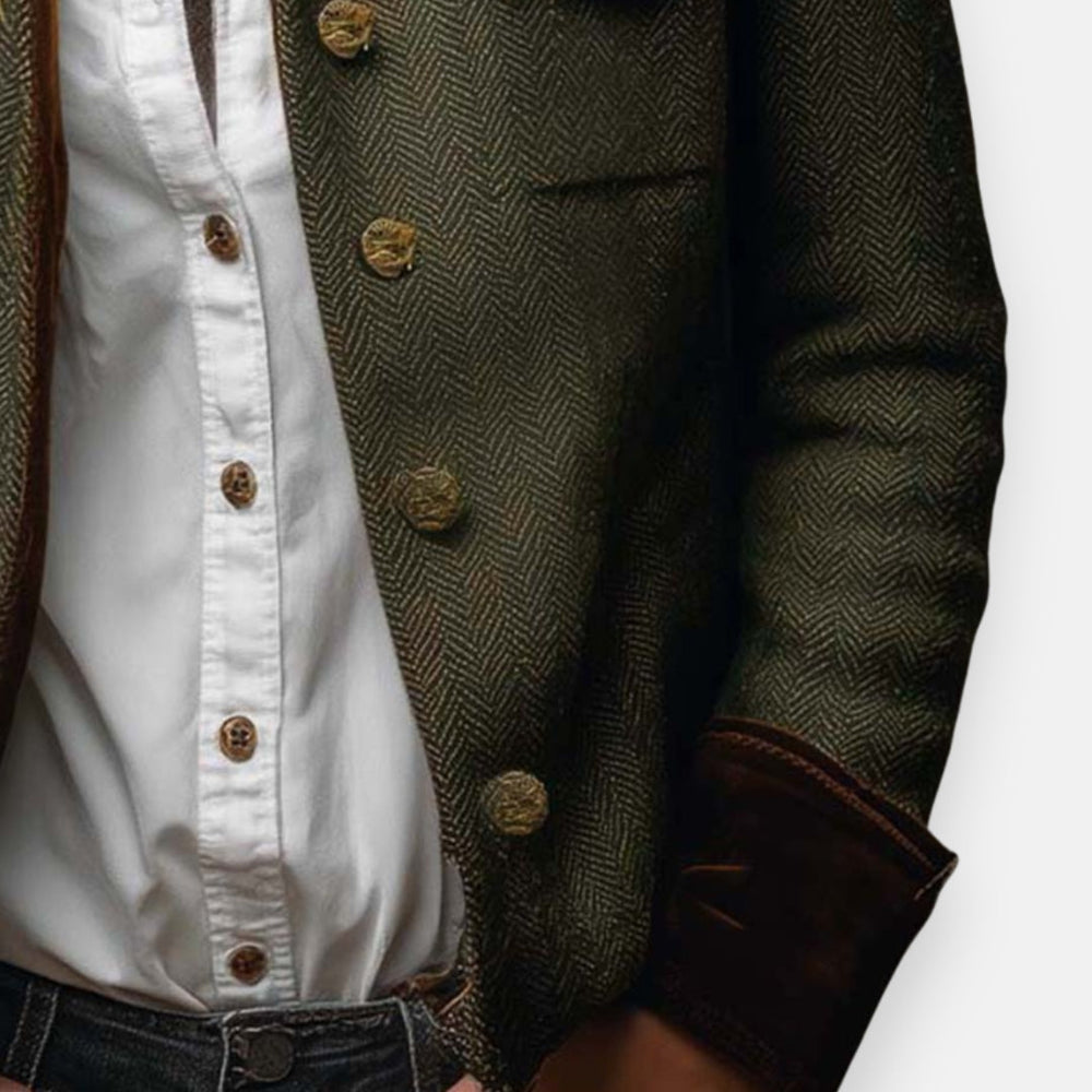Modieuze donkergroene dames visgraat blazer, ideaal voor een zakelijke of casual chic outfit.