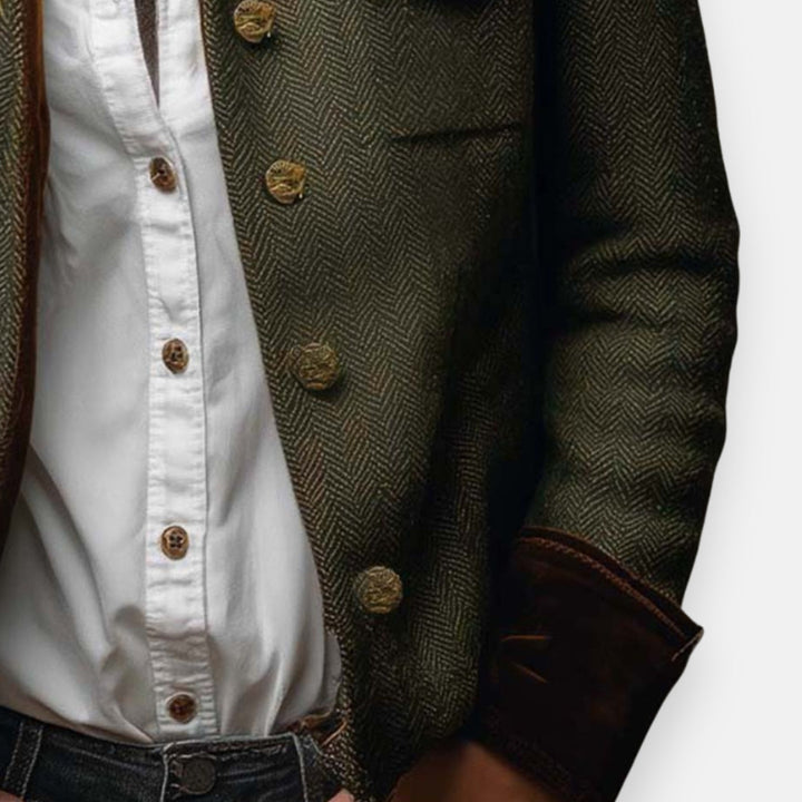 Modieuze donkergroene dames visgraat blazer, ideaal voor een zakelijke of casual chic outfit.