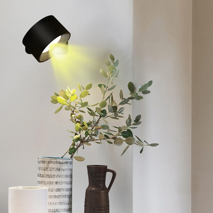 Stijlvolle draadloze oplaadbare 360° LED wandlamp, geschikt voor binnen en buiten, in hout, wit of zwart.