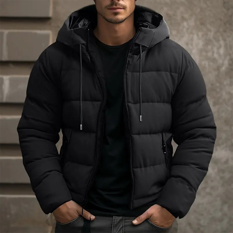 Detail van robuuste rits en warme manchet van de Finn heren pufferjas, perfect voor winterse dagen.