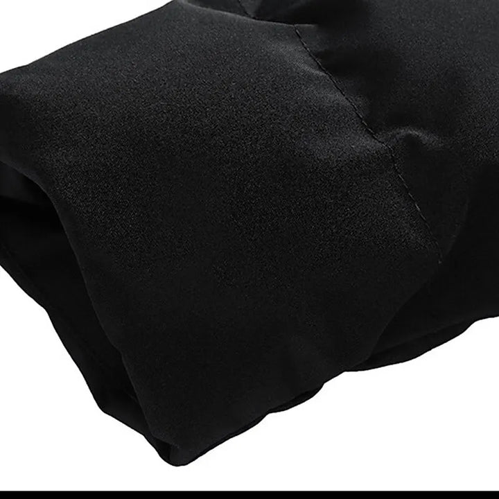 Rugzijde van de Finn heren winterjas, met stijlvol gewatteerd patroon en optimale pasvorm voor herenmode.