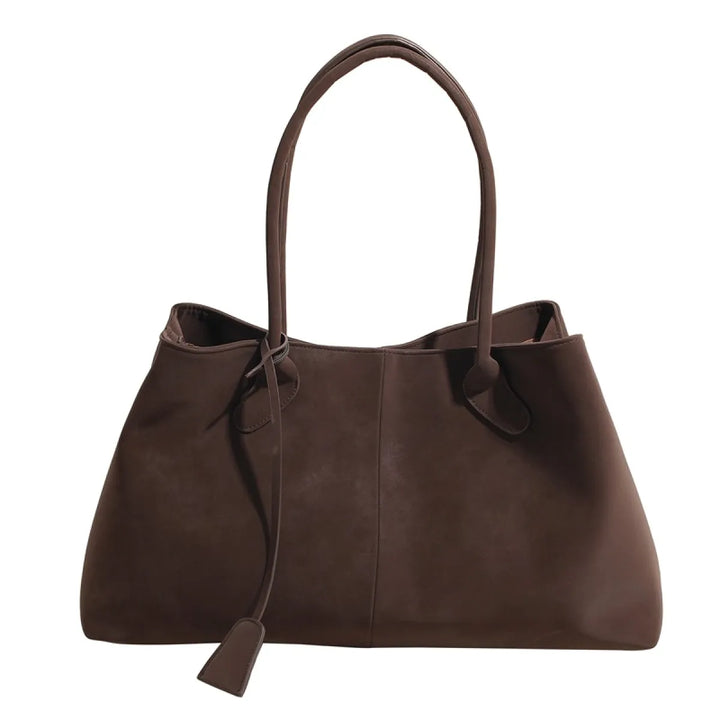 Modieuze bruine & zwarte damestas, ruime tote schoudertas. Chic en functioneel voor werk en casual outfits.