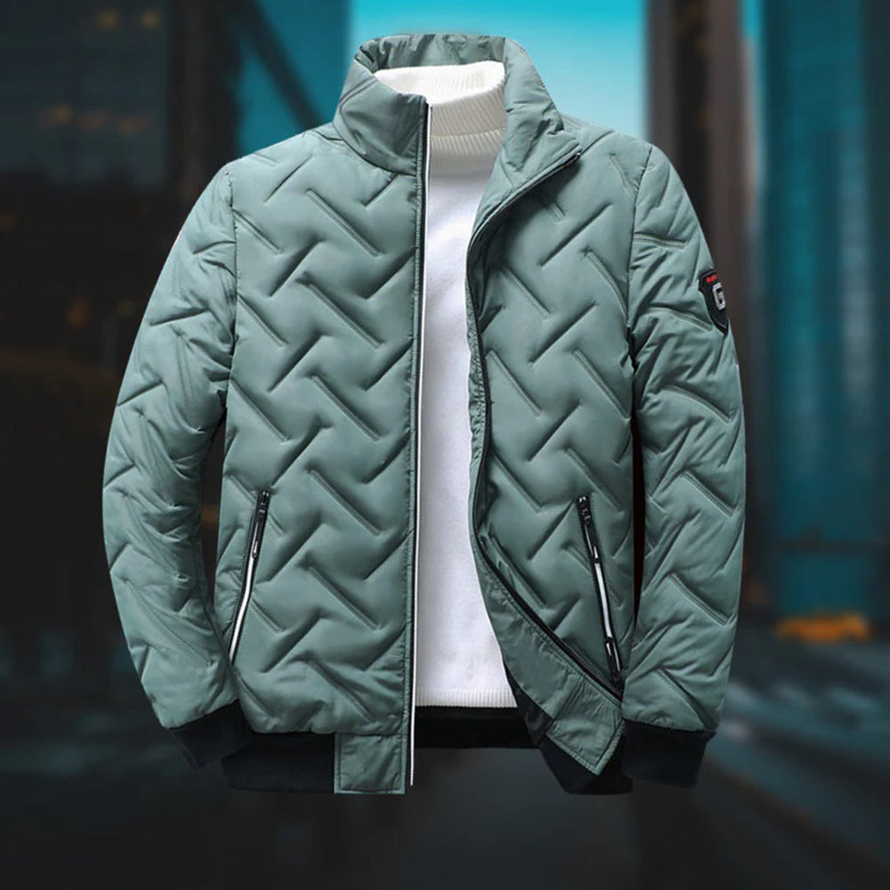 Grijze heren donsjas: een warme, lichtgewicht pufferjas. Ideaal als casual winterjas of bovenkleding voor diverse seizoenen.