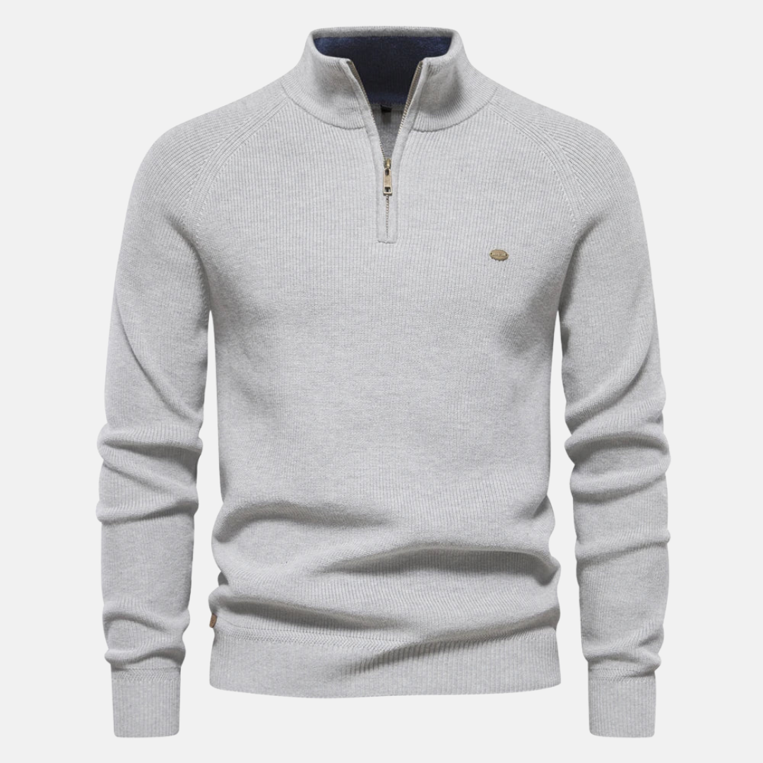 Heren halfzip sweater met ribgebreide mouwen, getoond op model. Comfortabele en stijlvolle herfst/winter pullover.