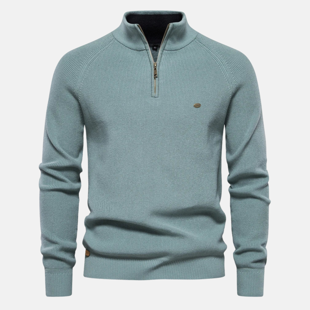 De half-zip sluiting en ribdetails op deze modieuze herenpullover, perfect voor casual herfstkleding.