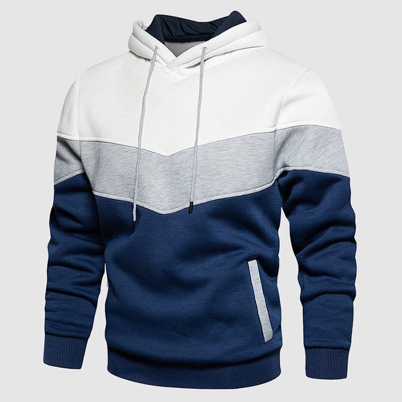 Stijlvolle heren hoodie met capuchon en moderne kleurblokken; perfect voor casual herfst- en wintermode.