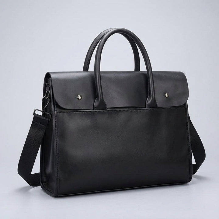Gedetailleerde weergave van de heren laptoptas van PU leer. Ruim interieur voor 14 inch laptop en organisatie.
