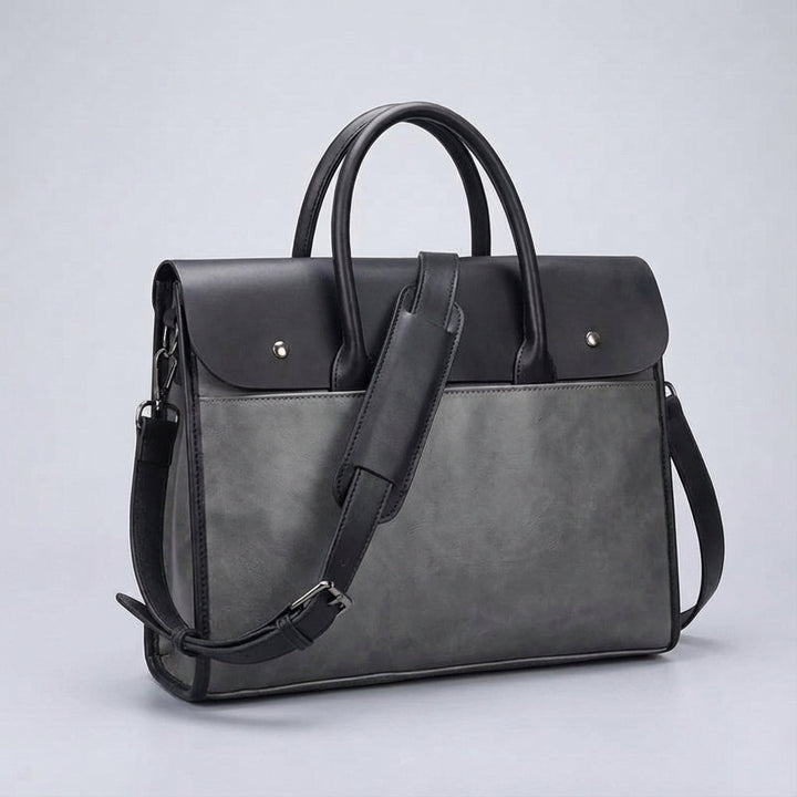 Luxe heren aktetas in retro stijl, gemaakt van PU leer voor 14 inch laptops. Voor de georganiseerde professional.