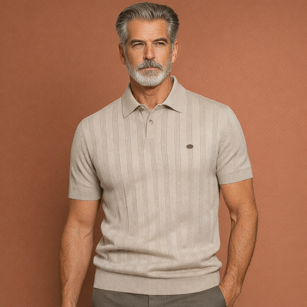 Zachte en ademende heren polo van merinowol, met verfijnde knit structuur. Stijlvol en comfortabel.