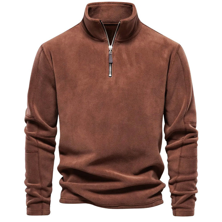 Donkergrijze heren trui met halve rits voor warmte en stijl. Perfect voor koude dagen en buitenactiviteiten.