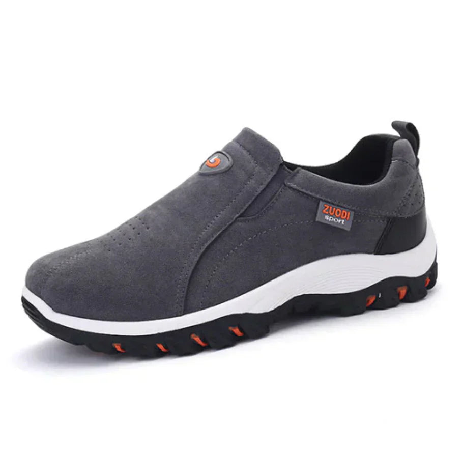 Detail van elastisch paneel op heren slip-on sneakers, wat zorgt voor een perfecte pasvorm en comfort.