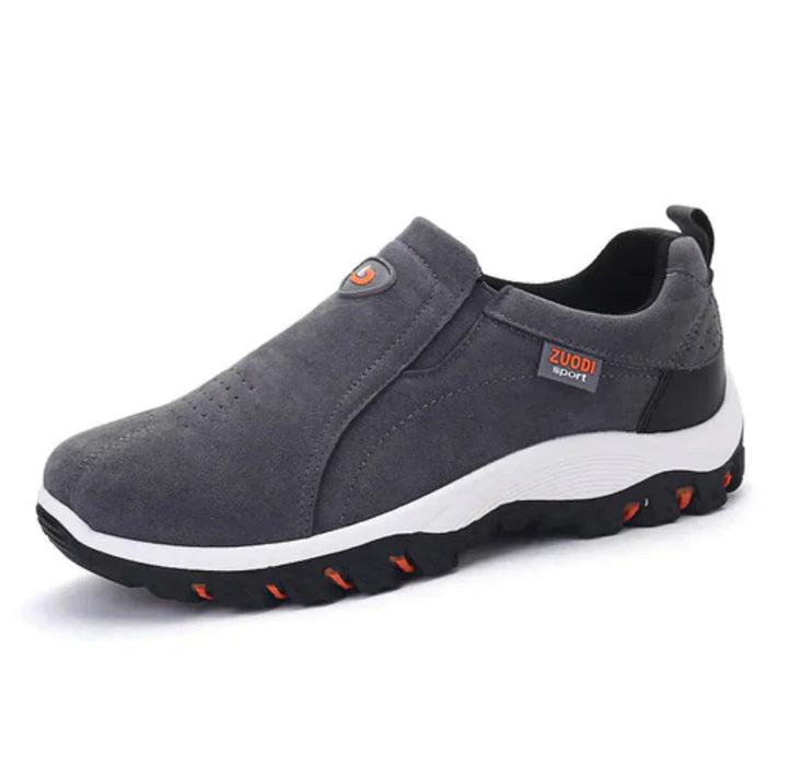 Detail van elastisch paneel op heren slip-on sneakers, wat zorgt voor een perfecte pasvorm en comfort.