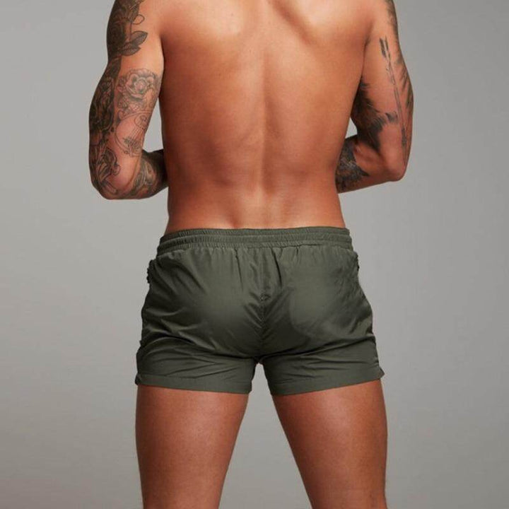 Stijlvolle heren zwembroek met sneldrogende eigenschappen en comfortabele pasvorm, verkrijgbaar in 9 kleuren, perfect voor strand en zwembad.