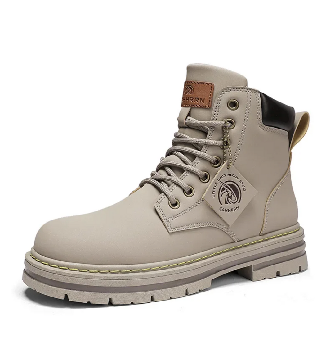 Stijlvolle herenboots met uniek patchwork design, ideaal voor trendy casual winteroutfits.