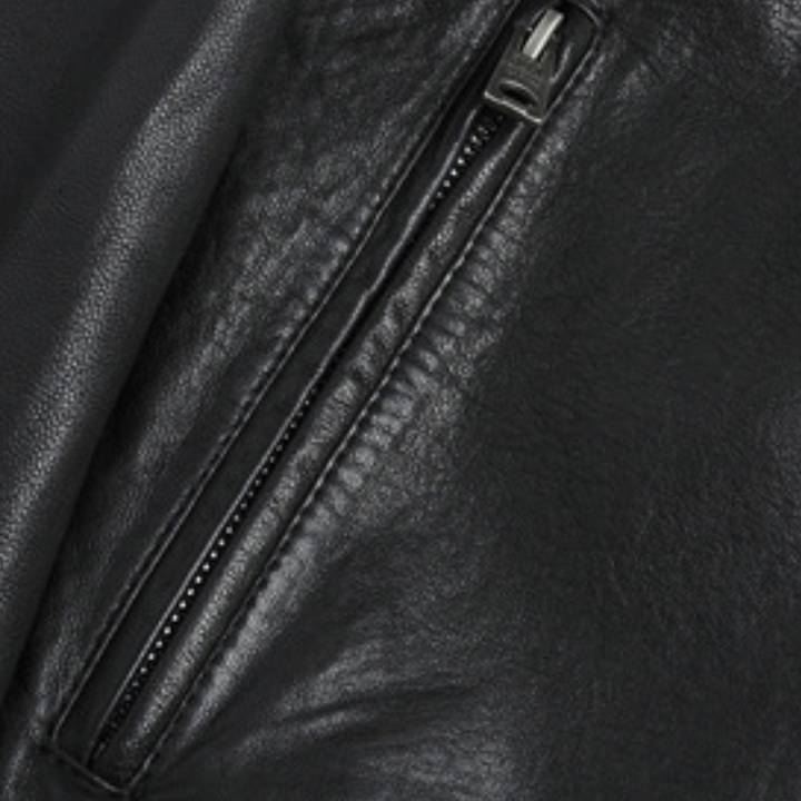 Detailopname van de comfortabele stof van de moderne herenjas. Perfecte kwaliteit voor bovenkleding.