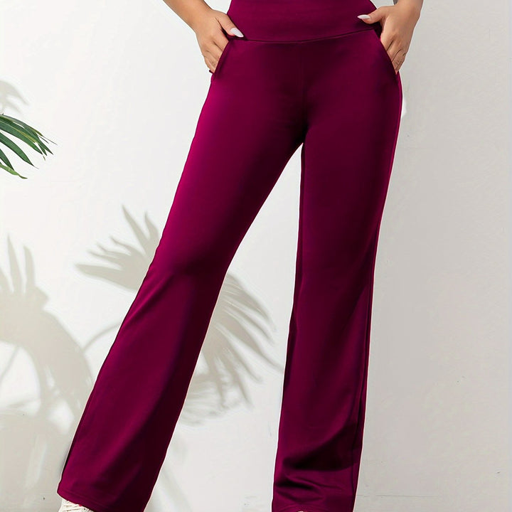 "Stijlvolle Kehlani flared broek voor dames, elastische taille, trendy flair, mix van comfort en chique stijl."
