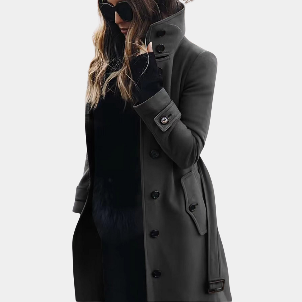 Elegante dames winterjas: lange trenchcoat met riem, houdt je warm en modieus in de kou.