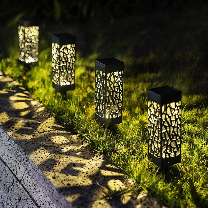 "Stijlvolle tuinlamp op zonne-energie, weerbestendig ontwerp, warme sfeerverlichting voor tuin zonder kabels."