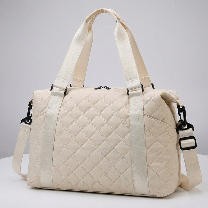 Praktische gewatteerde weekendtas Quiltiva als handbagage of sporttas, ruim en comfortabel.