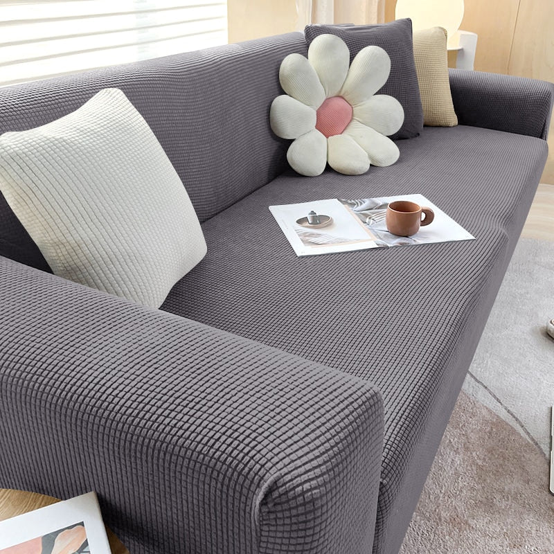 "StretchGuard rekbare bankhoes, elastisch, stijlvolle bescherming, antislip, perfecte pasvorm, modern interieurdesign"