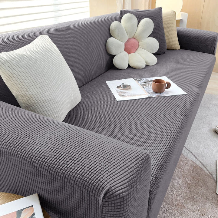 "StretchGuard rekbare bankhoes, elastisch, stijlvolle bescherming, antislip, perfecte pasvorm, modern interieurdesign"