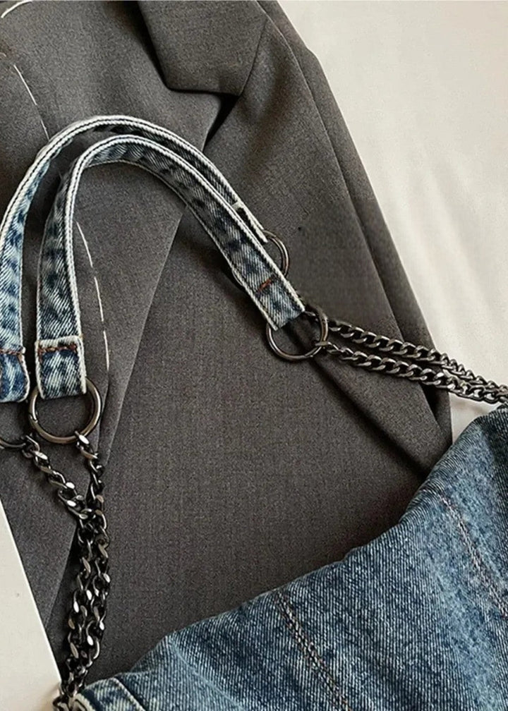 Veelzijdige dames schoudertas van denim, ideaal voor elke urban outfit, met kettingdetail.