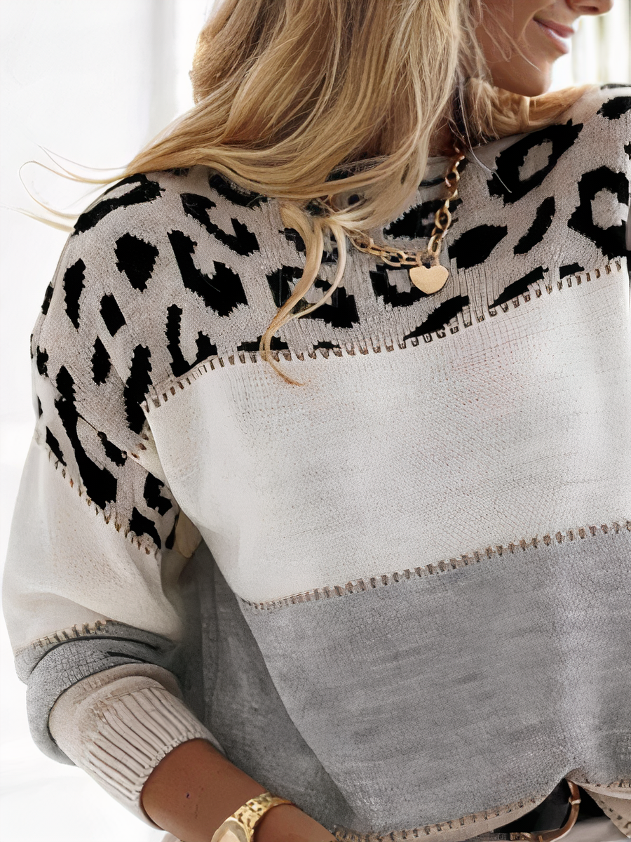 Stijlvolle dames pullover met unieke gestreepte panterprint; perfecte trendy casual kleding voor de winter.