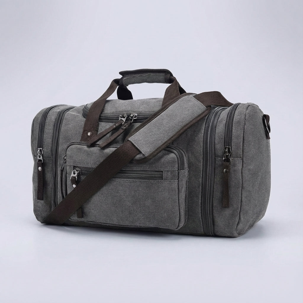 Comfortabele canvas schoudertas WeekenderPro, uitbreidbare unisex reisbagage voor weekendtrips.