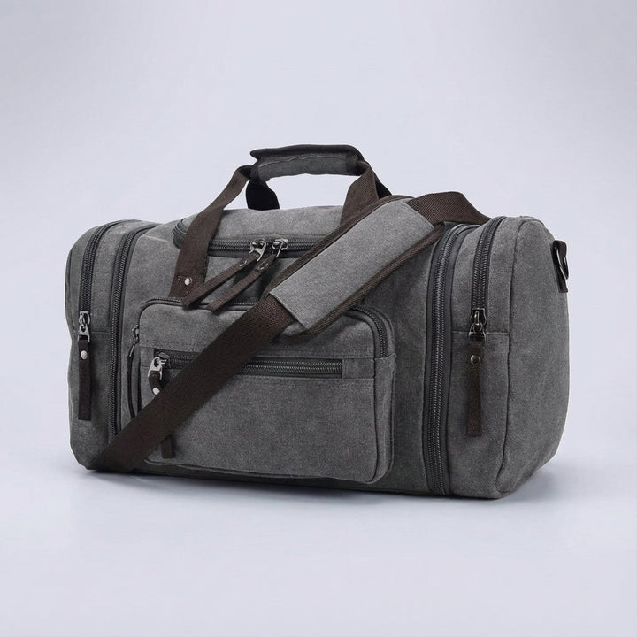 Comfortabele canvas schoudertas WeekenderPro, uitbreidbare unisex reisbagage voor weekendtrips.