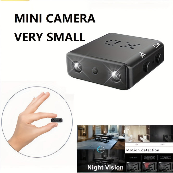 Mini camera, zwart, compact ontwerp met discrete lens en robuuste behuizing, met Full HD, nachtzicht en bewegingsdetectie.