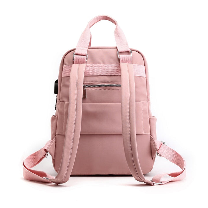Stevige schooltas/werkrugzak met anti-diefstal kenmerken en externe USB-poort voor opladen onderweg.