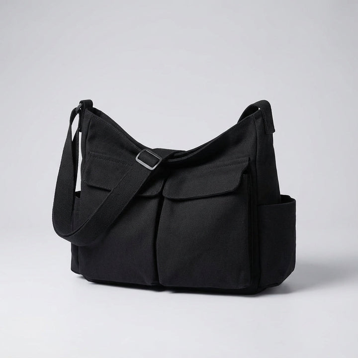 Comfortabele unisex canvas crossbody tas; ideaal voor actieve reizen en georganiseerd leven.