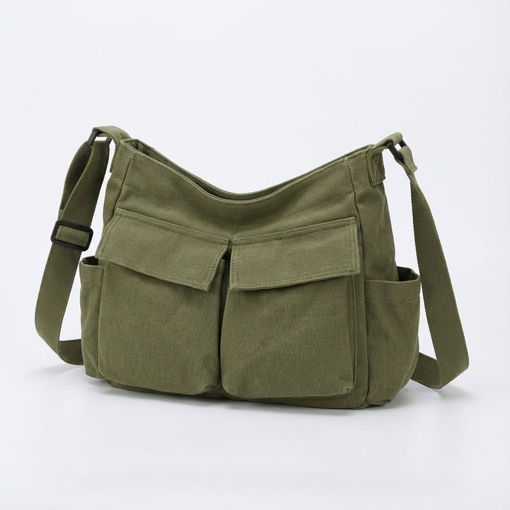 Praktische canvas messenger schoudertas; perfect voor dagelijkse organisatie en woon-werkverkeer.