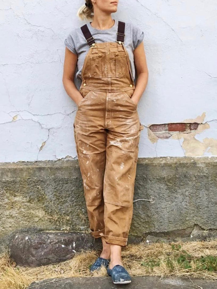 Stevige unisex werkoverall van zwaar canvas katoen, perfect voor intensief gebruik, met verstelbare bretels.