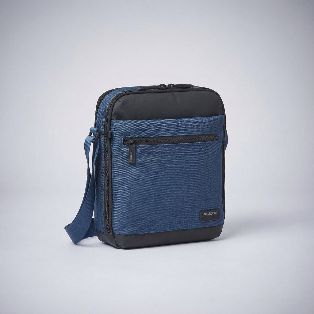 Compacte unisex CarryGuard schoudertas. Ideale crossbody tas met ingebouwde organiser en RFID bescherming.