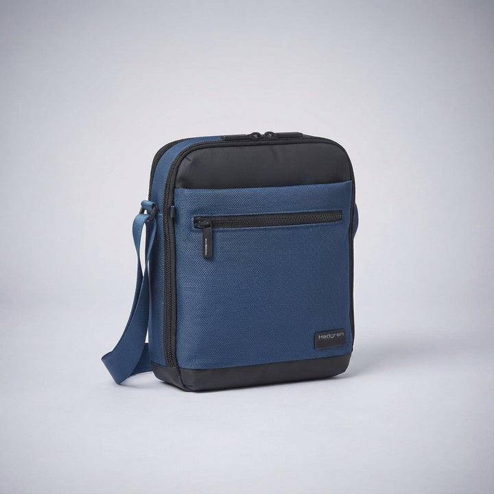 Compacte unisex CarryGuard schoudertas. Ideale crossbody tas met ingebouwde organiser en RFID bescherming.