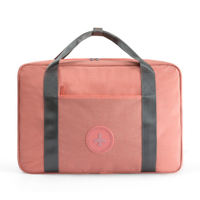 Lichtgewicht handbagage reistas met kofferbevestiging, perfect voor reizen en organisatie.