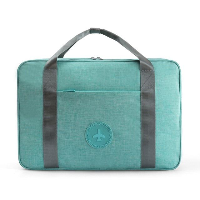 Handige handbagage reistas; past perfect in overhead compartiment, zorgeloos reizen gegarandeerd.