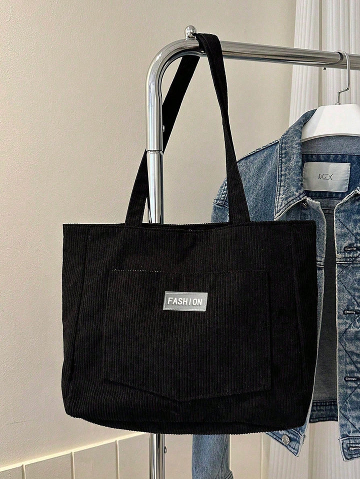 Praktische unisex corduroy schoudertas, duurzaam en met een ruime inhoud.