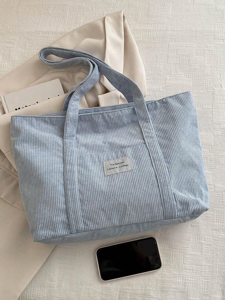 Moderne unisex werktas van corduroy, groot formaat en stijlvol design.